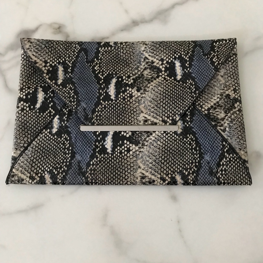 BCBG envelope clutch bag with snakeskin print